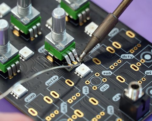 Glowing circuit workshop in the fictional Crown Circuit Crafter mobile game